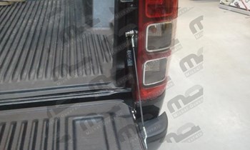Aide ouverture ridelle Ford Ranger